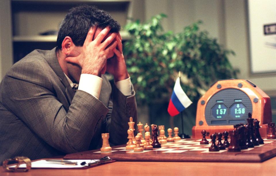 World Chess Champion Garry Kasparov looks at the c