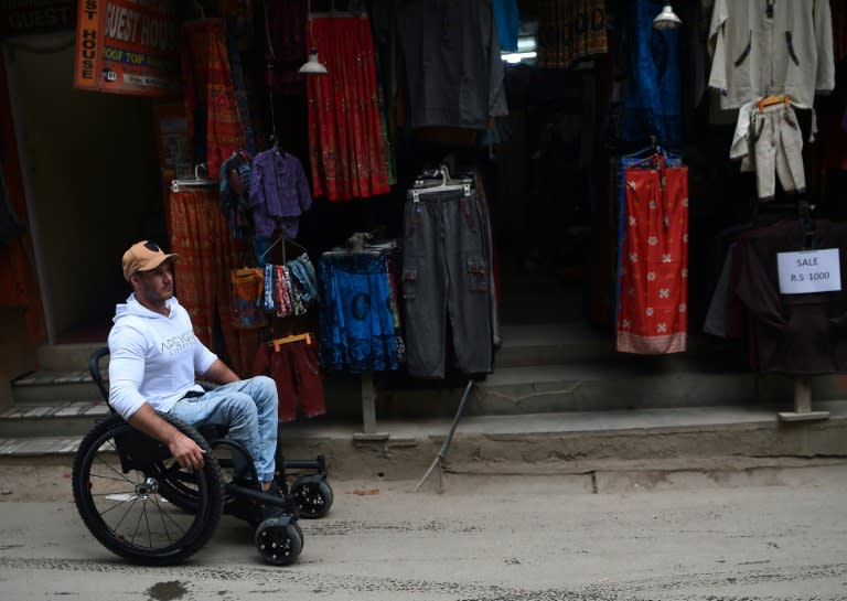 Australian Scott Doolan will be using a specially designed wheelchair with mountain bike wheels