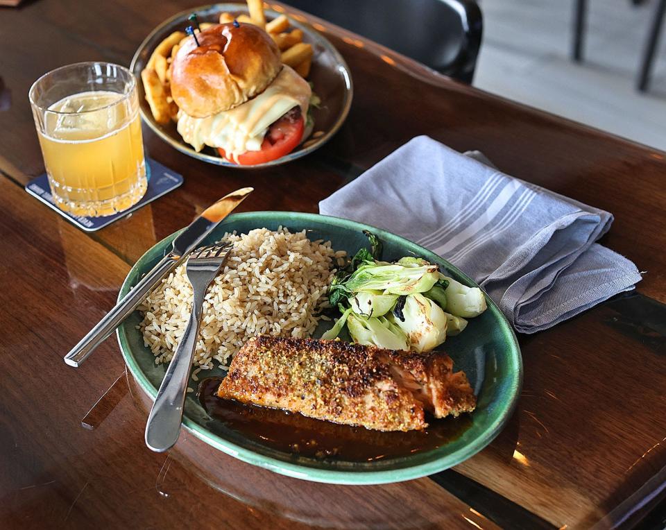 Pacific salmon encrusted with panko breadcrumbs and bock choy with brown rice from The Tree on Washington Street in Braintree, shown on Monday, April 1, 2024.