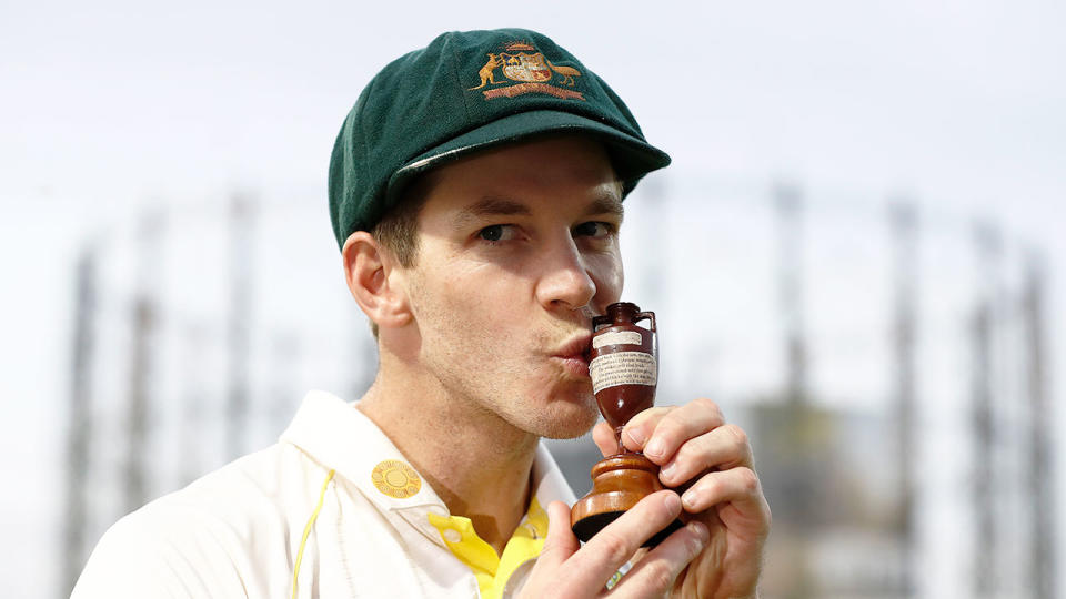 Seen here, Tim Paine kisses the Ashes trophy during the series in 2019.