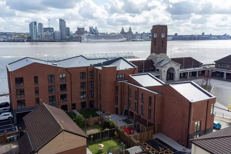 Ferry Court, a modern apartment building designed by DK Architects, is next door to Seacombe Ferry terminal in Wallasey