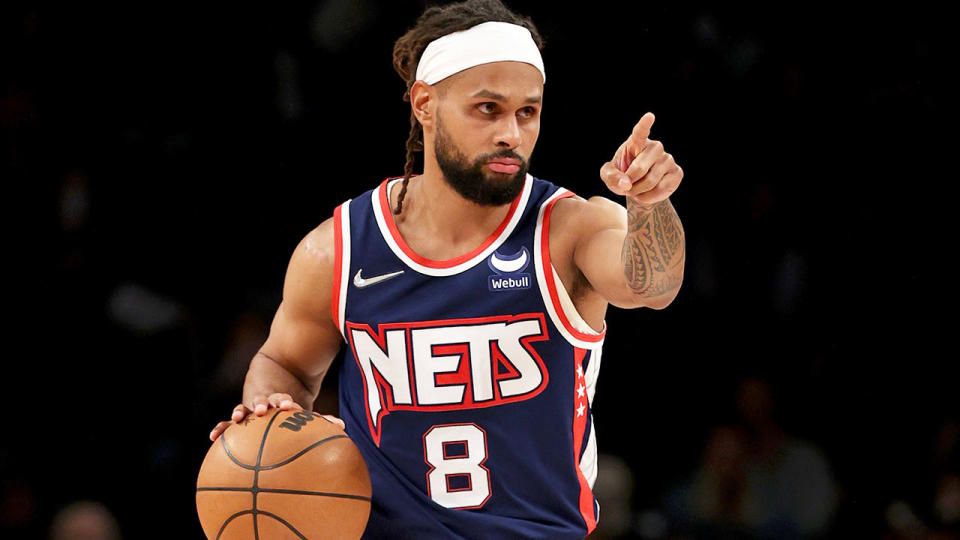 Seen here, Patty Mills dribbles the ball up for the Brooklyn Nets.