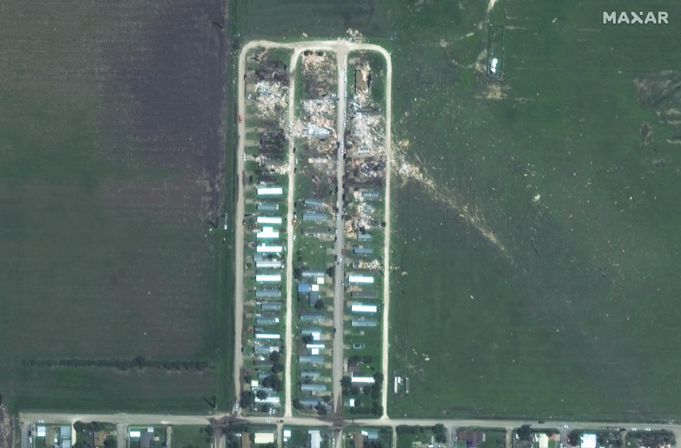 This Saturday, June 16, 2023, satellite image from Maxar Technologies shows the damage to a mobile home park from a tornado that hit Perrytown, Texas, on Thursday, June 15, 2023. The tornado in Perryton killed three people, destroyed hundreds of homes, tossed vehicles into buildings and knocked out power. (Satellite image ©2023 Maxar Technologies via AP)