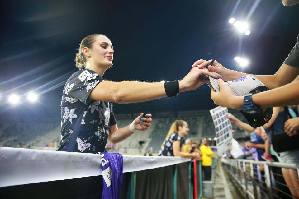 May 18, 2022; Louisville, Kentucky, USA; Racing Louisville FC player Emily Fox (11) with fans after the game against the San Diego Wave FC at Lynn Family Stadium. Mandatory Credit: EM Dash-USA TODAY Sports
