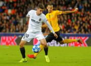 Soccer Football - Champions League - Group Stage - Group H - Valencia v Young Boys - Mestalla, Valencia, Spain - November 7, 2018 Valencia's Ferran Torres in action with Young Boys' Djibril Sow REUTERS/Heino Kalis