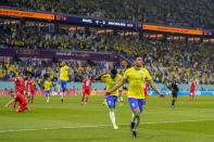 Brazil's Casemiro celebrates after scoring his side's opening goal during the World Cup group G soccer match between Brazil and Switzerland, at the Stadium 974 in Doha, Qatar, Monday, Nov. 28, 2022. (AP Photo/Andre Penner)