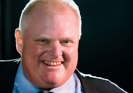 Toronto Mayor Rob Ford smiles during his first appearance since being released from the hospital where he was undergoing cancer treatment at "Ford Fest", a party held by the Ford family where the public is invited, in Toronto, in this file photo from September 27, 2014. REUTERS/Mark Blinch/Files