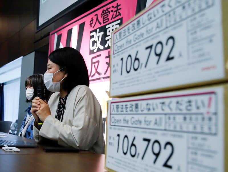 Activists attend a news conference on Japan's revised immigration law bill in Tokyo