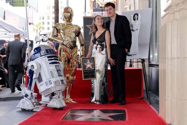 <p>David Livingston/Getty Images</p> R2D2, CP30, Billie Lourd and Austen Rydell attend the ceremony for Carrie Fisher being honored posthumously with a Star on the Hollywood Walk of Fame on May 04, 2023 in Hollywood, California