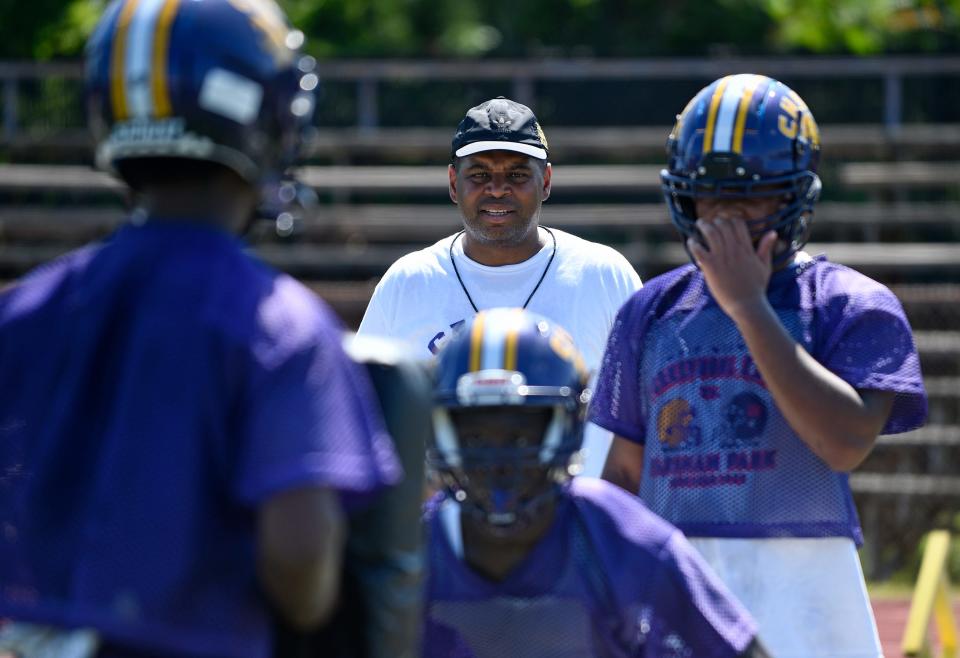 Camden High School football coach Rob Hinson watches over practice on Wednesday, Aug. 10, 2022.