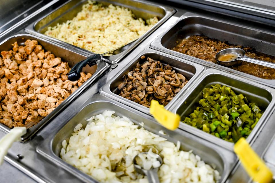 Chicken and other toppings for meals at Grand Grillin on Tuesday, June 13, 2023, in East Lansing.