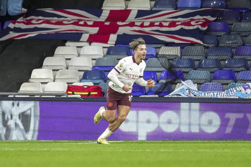 Manchester City's Jack Grealish celebrates scoring his side's 2nd goal during the English Premier League soccer match between Luton Town and Manchester City at Kenilworth Road stadium in Luton, England, Sunday Dec. 10, 2023. (AP Photo/Kin Cheung)