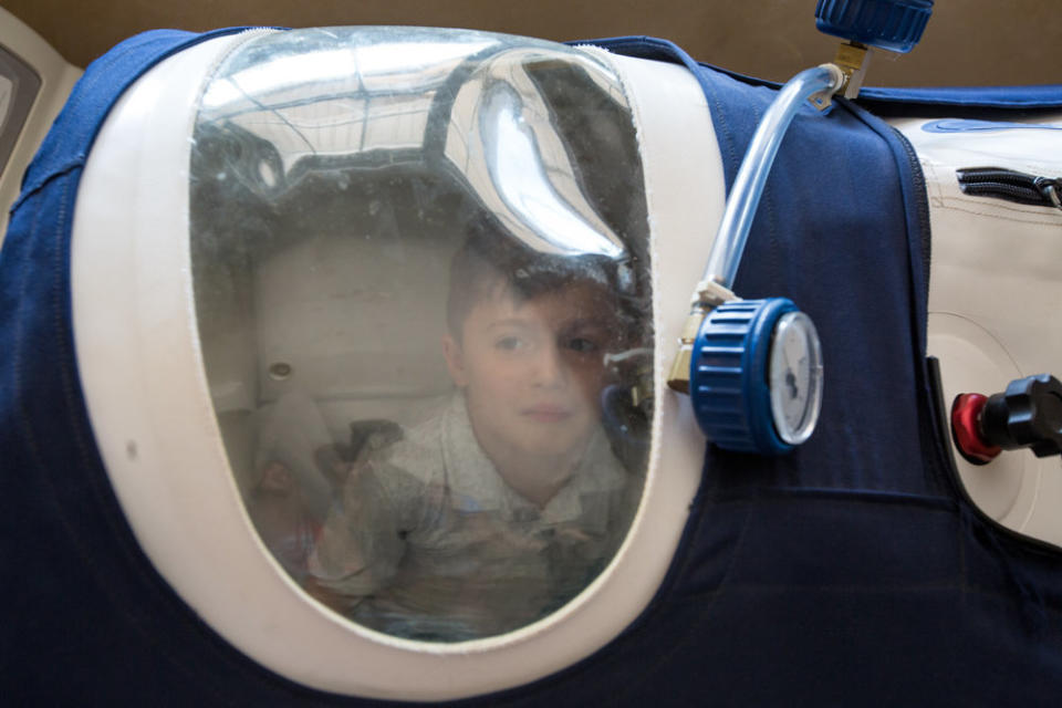 Jamesy often sleeps in a hyperbaric chamber to help improve his breathing, and his dad always joins him. He has been diagnosed with <a href="https://ghr.nlm.nih.gov/condition/duchenne-and-becker-muscular-dystrophy" target="_blank">Duchenne muscular dystrophy.</a>