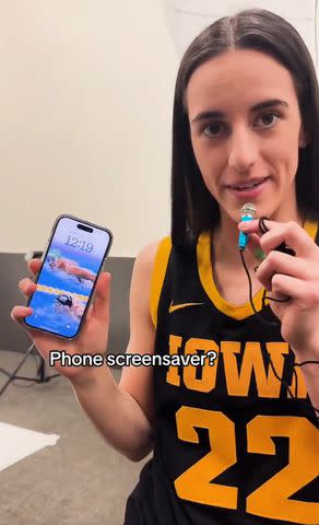 <p>NCAA March Madness/X</p> Clark showing her phone screen