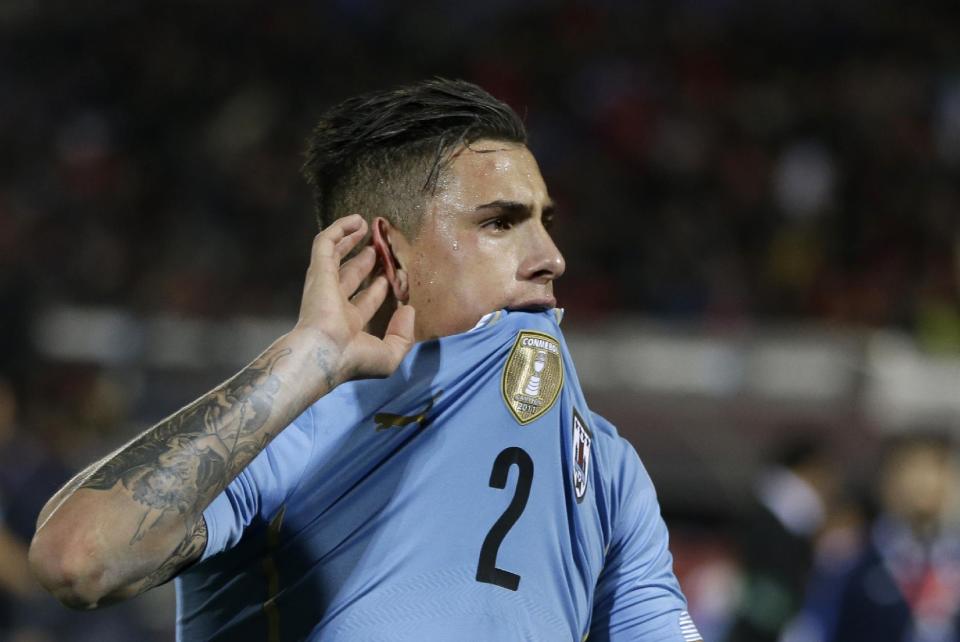 Uruguay&#39;s Jose Maria Gimenez leaves the pitch after being defeated 1-0 by Chile in a Copa America quarterfinal soccer match at the National Stadium in Santiago, Chile, Wednesday, June 24, 2015. (AP Photo/Ricardo Mazalan)