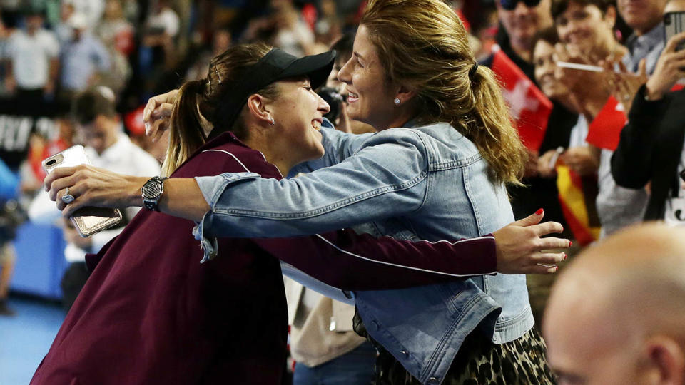 Belinda Bencic embraces Mirka Federer. (Photo by Will Russell/Getty Images)