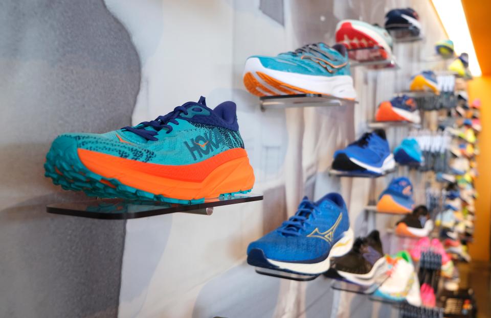 An array of colorful running shoes are on display at the Red Coyote Running and Fitness store located in Classen Curve.