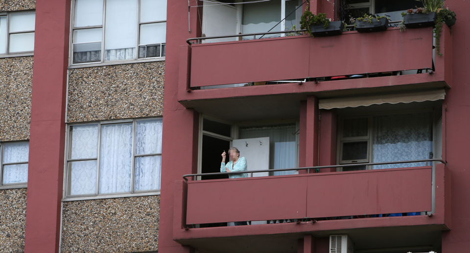 Pictured is an unidentified woman in a public housing in Sydney