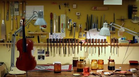 A violin is seen at Edgar Russ' workshop in Cremona, Italy, March 10, 2016. REUTERS/Stefano Rellandini