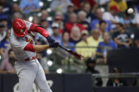 St. Louis Cardinals' Nolan Arenado hits a two-run home run during the first inning of a baseball game against the Milwaukee Brewers, Monday, Sept. 20, 2021, in Milwaukee. (AP Photo/Aaron Gash)