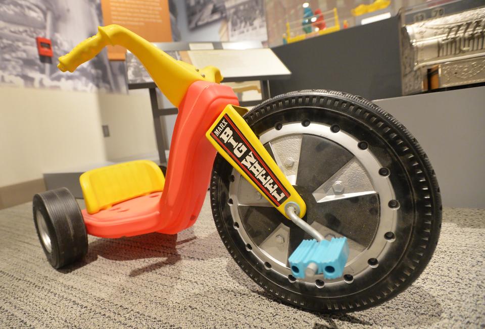 A 'Big Wheel,' manufactured by Marx Toys, is displayed at the Hagen History Center in Erie.