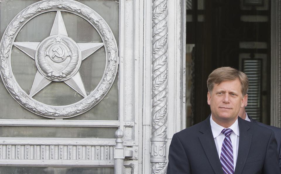 FILE - In this Wednesday, May 15, 2013 file photo the U.S. Ambassador to Russia Michael McFaul leaves the Foreign Ministry in Moscow, Russia. The U.S. ambassador to Russia has announced that he is stepping down after two turbulent years in Moscow. Michael McFaul is considered the architect of President Barack Obama's effort to reset relations with Russia. (AP Photo/Misha Japaridze, File)