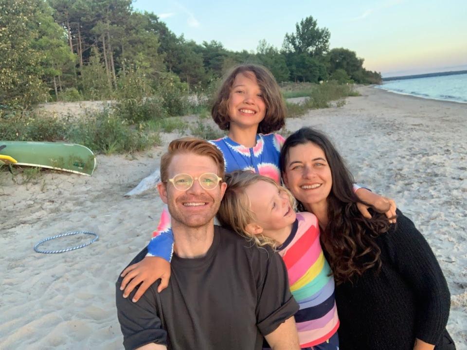 James Weaver, shown here with his wife Clare and kids Lucy and Raines, is helping develop computer algorithms that can mine patient health records to help others.