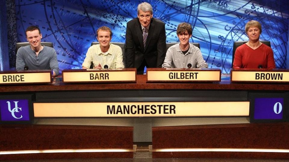 Ex-host Jeremy Paxman with Manchester's winning 2013 team