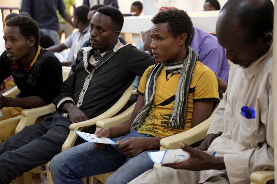 In this photo taken on Monday, Jan. 2, 2017, Ethiopian migrants gather at the International Organization for Migration center in the port city of Aden, Yemen. Despite Yemen’s civil war, migrants from Ethiopia and Saudi Arabia are streaming in, hoping to make their way to wealthy Saudi Arabia. Instead, they often meet torture, rape and imprisonment at the hands of smugglers. (AP Photo/Maad Al-Zikry)