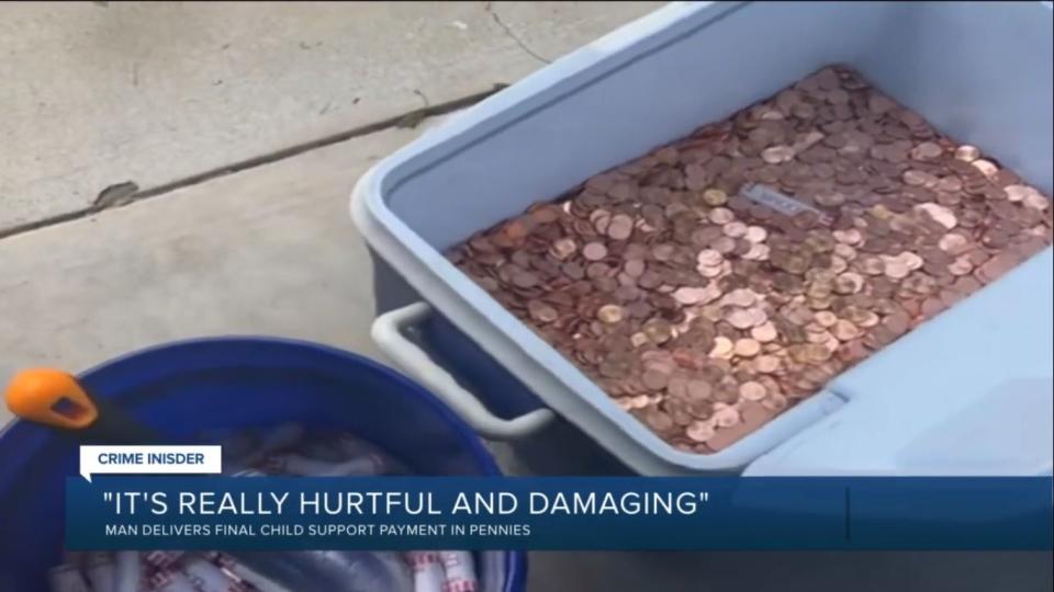 The family in Richmond neighbourhood scooped up the 80,000 pennies by using a shovel with the help of friends  (Screengrab/WTVR)