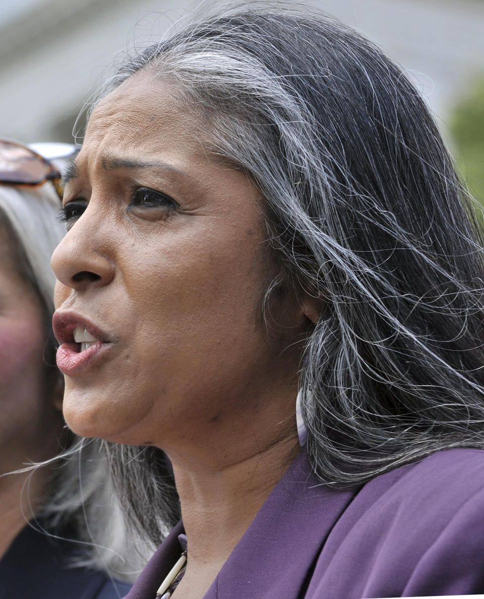 FILE - In this June 8, 2010, file photo, Cheryl Andrews-Maltais speaks during a rally at the Statehouse in Boston. When Sen. John Barrasso, R-Wyo., snapped at Deb Haaland during her confirmation hearing, many in Indian Country were incensed. “If it was any other person, they would not be subjected to being held accountable for their ethnicity,” said Andrews-Maltais, chairwoman of the Wampanoag Tribe of Gay Head Aquinnah in Massachusetts. (AP Photo/Josh Reynolds, File)