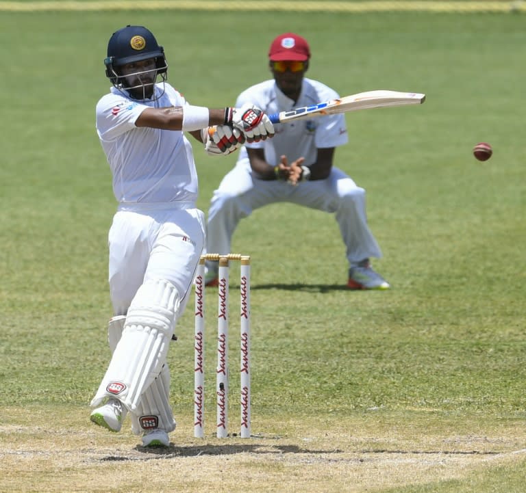 In the runs: Kusal Mendis in action on Sunday