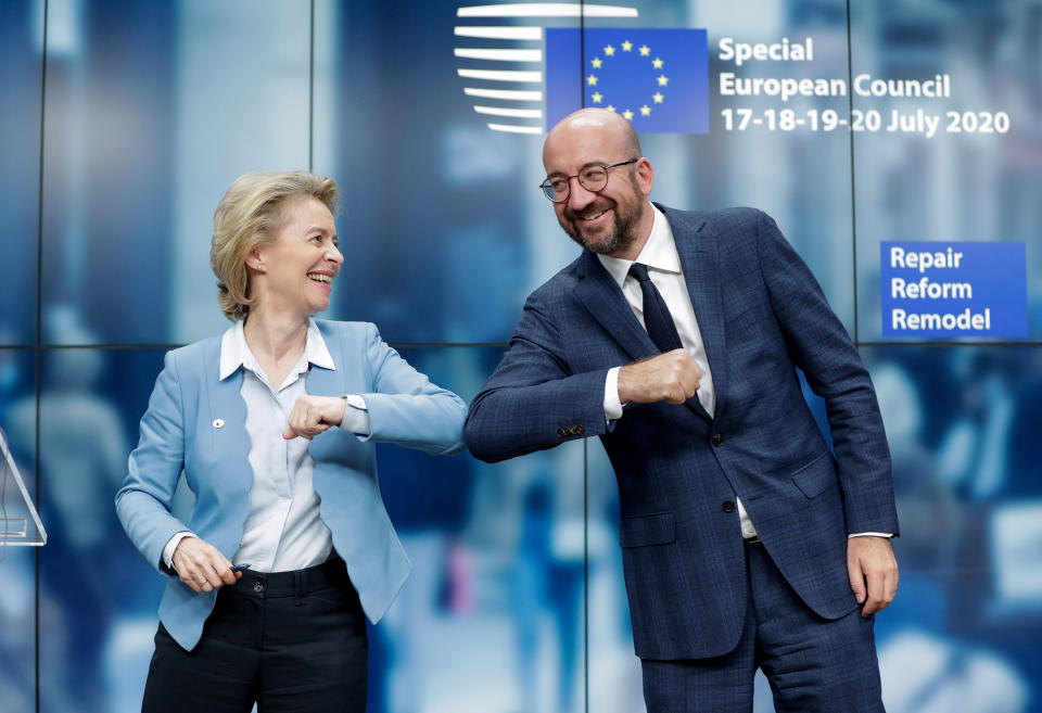 Image: European Council President Charles Michel and European Commission President Ursula Von Der Leyen do an elbow bump at the end of a news conference following a four-day European summit at the European Council in Brussels, (Stephanie Lecocq / Reuters)