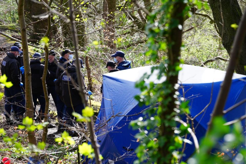 Police officers by a forensic tent at Kersal Dale, near Salford, Greater Manchester, where a major investigation has been launched after human remains were found on Thursday evening (Peter Byrne/PA Wire)