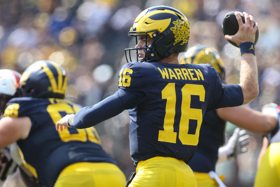 ANN ARBOR, MI - SEPTEMBER 14:  Michigan Wolverines quarterback Davis Warren (16) throws a pass during the first quarter of a non-conference college football game between the Arkansas State Red Wolves and the Michigan Wolverines on September 14, 2024 at Michigan Stadium in Ann Arbor, Michigan.  (Photo by Scott W. Grau/Icon Sportswire via Getty Images)