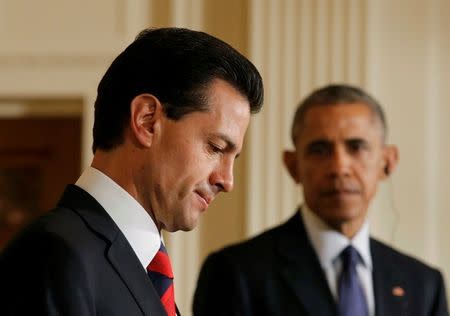 US President Barack Obama and Mexico President Enrique Pena Nieto (L) hold a news conference at the White House in Washington, U.S. July 22, 2016. REUTERS/Carlos Barria