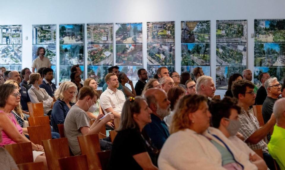 People listened to a presentation about the South Loop project during a public meeting last month.