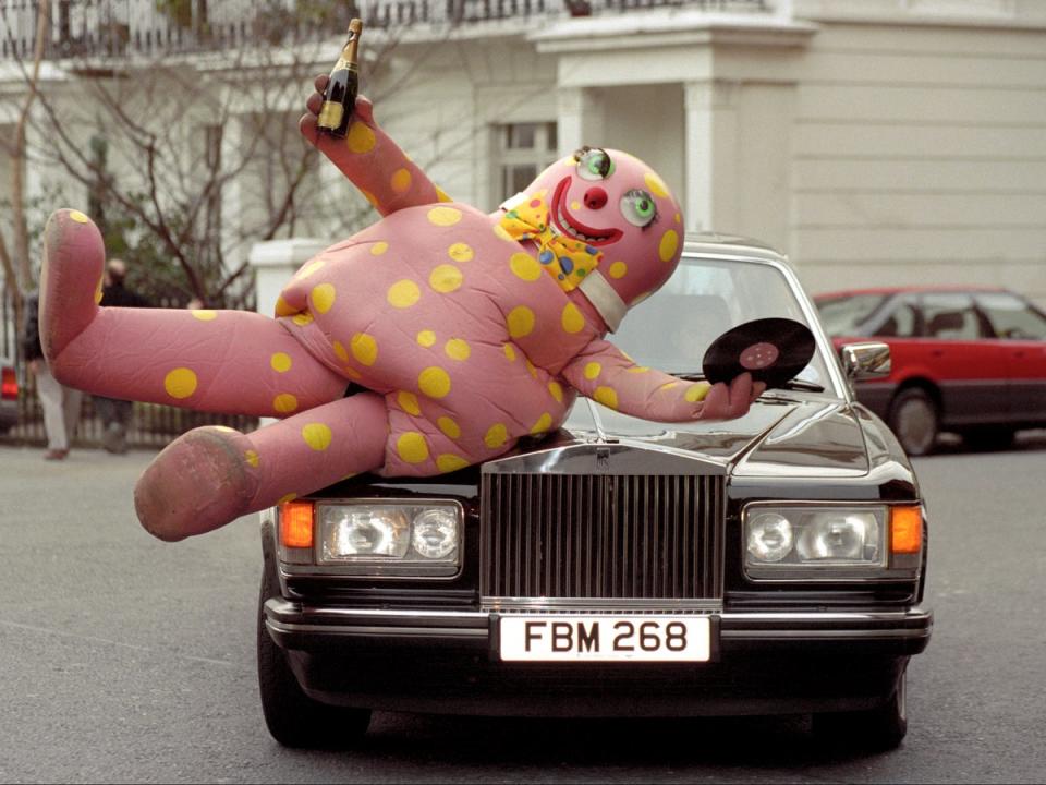 An auction for an original Mr Blobby costume has played out in a characteristically chaotic fashion (PA)