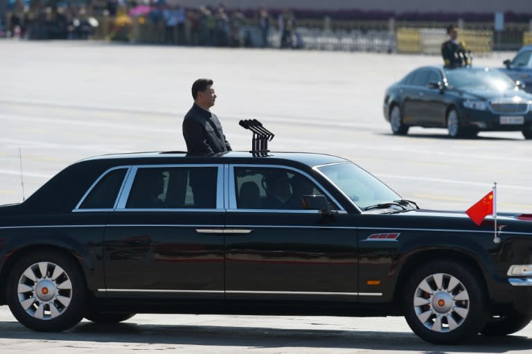 Chinese President Xi Jinping prepares to review troops during a military parade in Beijing's Tiananmen Square on September 3, 2015