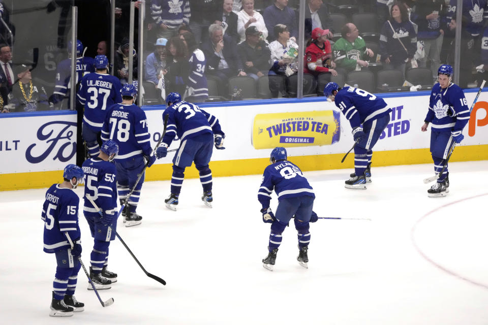 Toronto Maple Leafs players leave the ice after their loss to the Florida Panthers in NHL hockey second-round Stanley Cup playoff action in Toronto, Ontario, Thursday May 4, 2023. (Chris Young/The Canadian Press via AP)