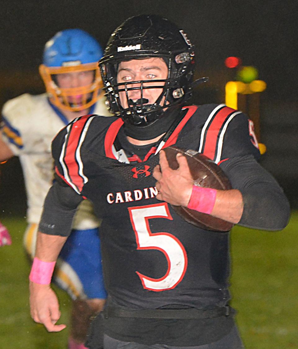 Deuel quarterback Trey Maaland scrambles for some yards during a high school football game on Friday, Oct. 13, 2023 in Clear Lake. The fifth-rated Class 11B Cardinals won 50-0.