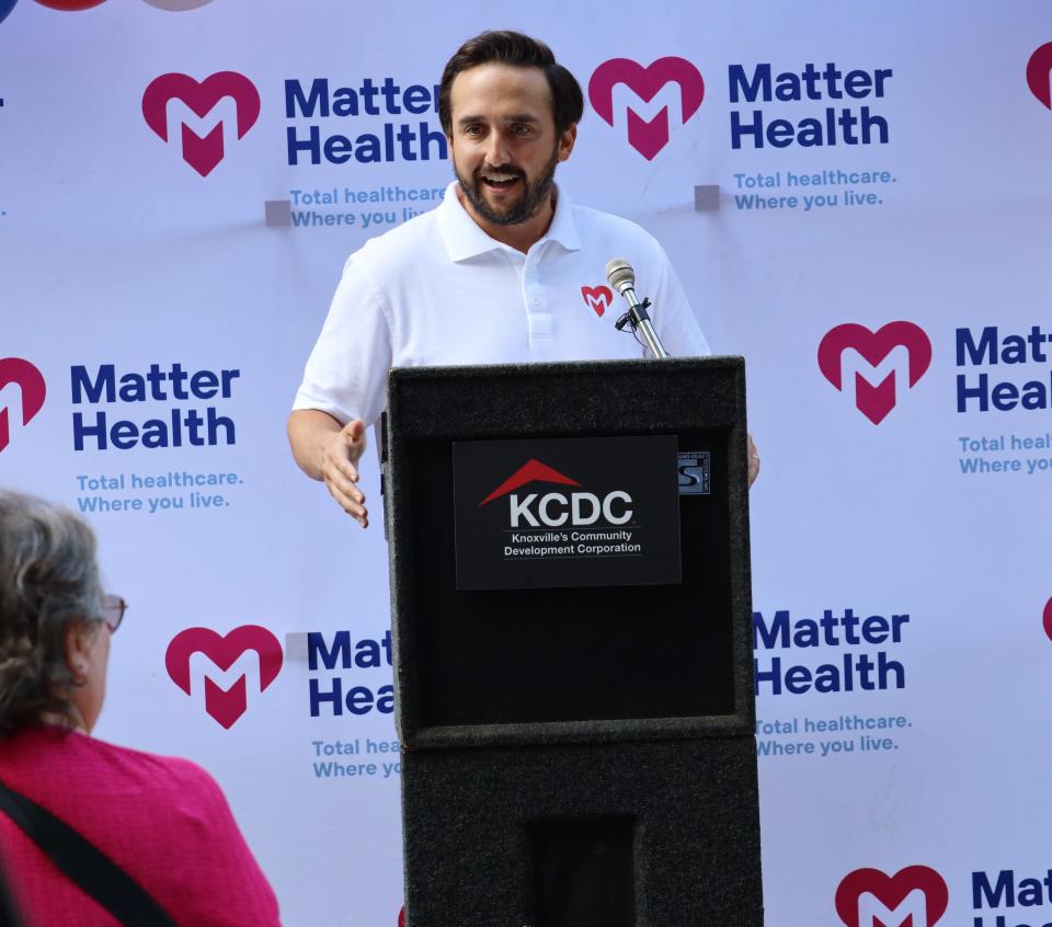 Mason Mercy of Matter Health speaks to the audience at the ribbon cutting for Matter Health’s wellness center for residents of Love Towers. July 6, 2023
