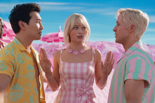 <p>Courtesy Warner Bros. Pictures</p> Simu Liu, Margot Robbie and Ryan Gosling in the 'Barbie' movie