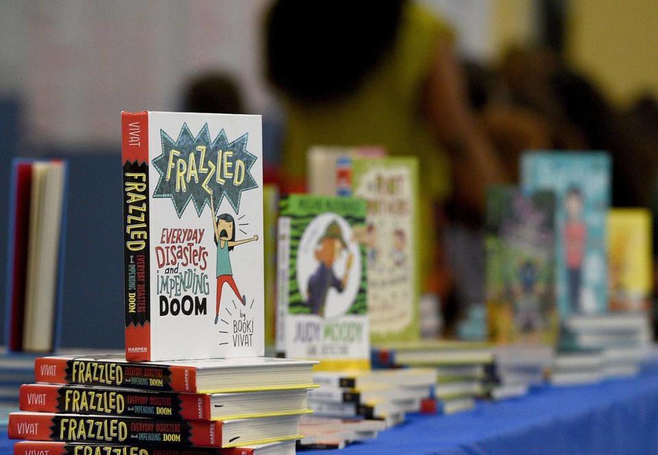 Bradenton Florida elementary, middle, high schools have new books restricted under new education laws endorsed by Gov. Ron DeSantis. Free books are on display at G.D. Rogers Garden-Bullock Elementary School in this file photo provided by the Florida Education Association in this file photo.