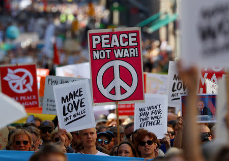 People attend 'Helsinki Calling' protest ahead of meeting between the U.S. President Donald Trump and Russian President Vladimir Putin in Helsinki, Finland July 15, 2018. REUTERS/Leonhard Foeger