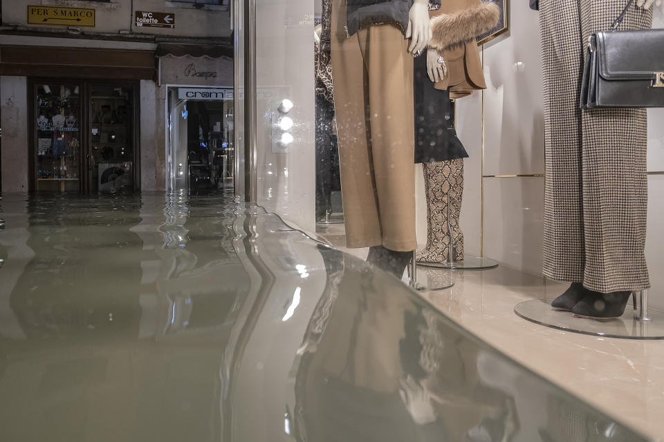 Water reaches shop mannequins after the heavy rain (Getty)