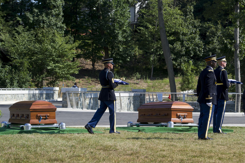 Casket teams from the 3rd Infantry Regiment, also known as the Old Guard, carry the flags which draped remains of two unknown Civil War Union soldiers caskets at Arlington National Cemetery in Arlington, Va.,Thursday, Sept. 6, 2018. The soldiers were discovered at Manassas National Battlefield and will be buried in Section 81. Arlington National Cemetery opened the new section of gravesites with the burial. (AP Photo/Cliff Owen)