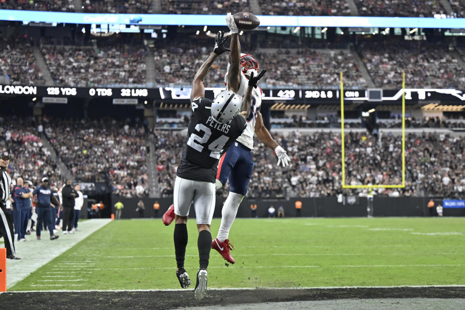 New England Patriots wide receiver Kendrick Bourne, above, can't haul in a pass in the end zone as Las Vegas Raiders cornerback Marcus Peters (24) defends during the second half of an NFL football game Sunday, Oct. 15, 2023, in Las Vegas. (AP Photo/David Becker)