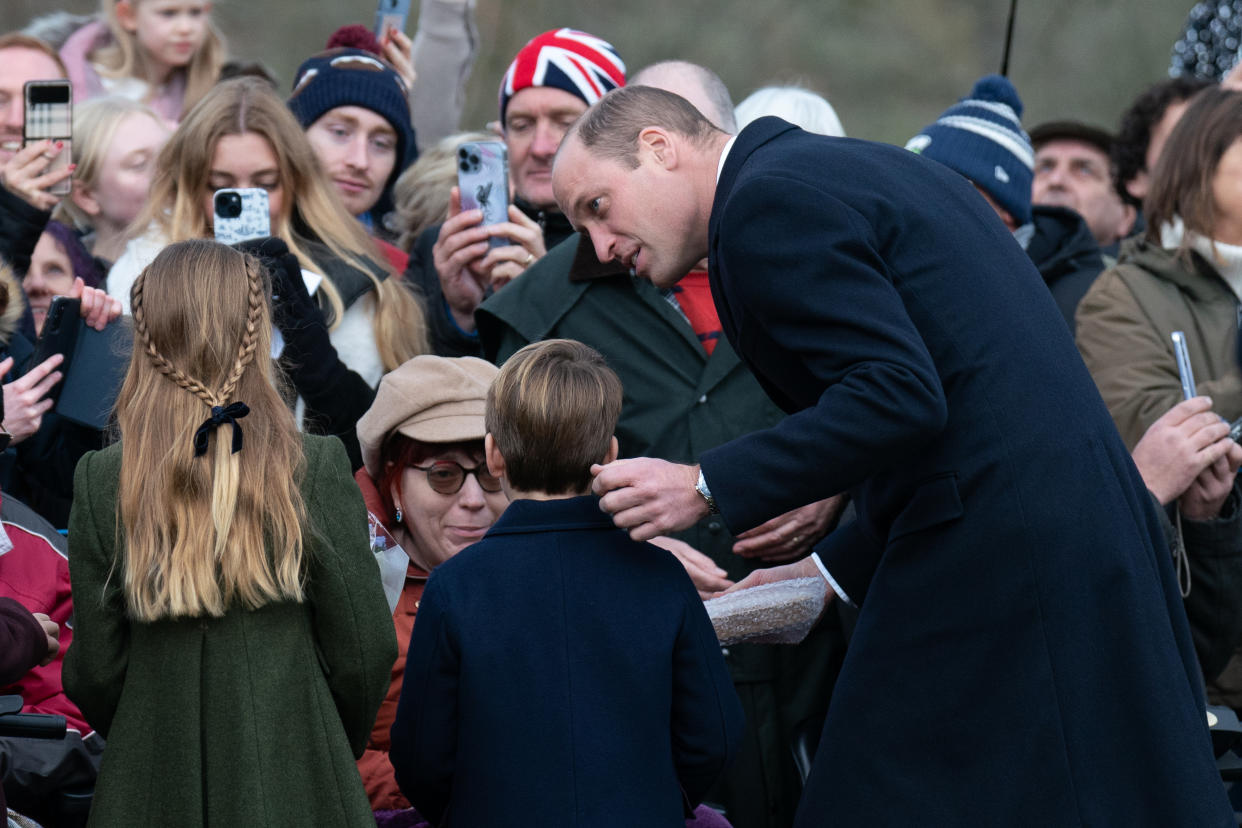 (left to right) Princess Charlotte, Prince Louis and the Prince of Wales meet well-wishers after attending the Christmas Day morning church service at St Mary Magdalene Church in Sandringham, Norfolk. (PA)