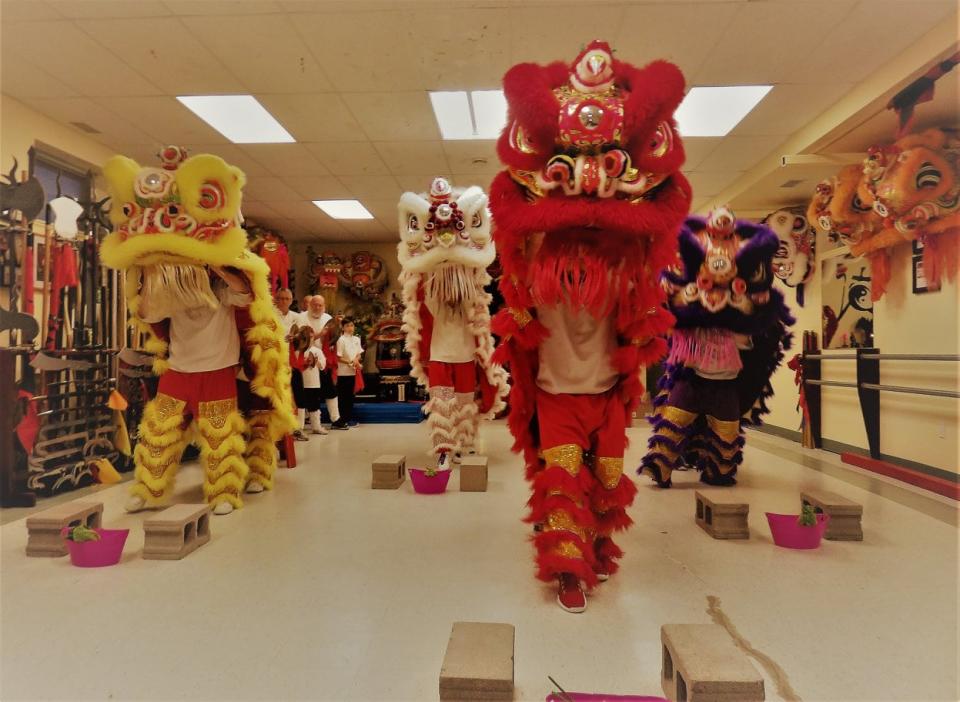 Regina Kung Fu puts on a lion dance performance.